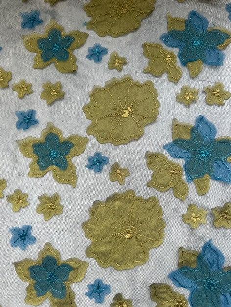 FRENCH ALL OVER LASER CUT FLORAL APPLIQUE ON A BLUE TULLE BASE